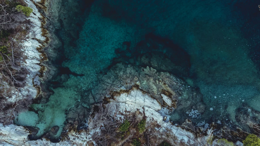 the water is still crystal clear and blue