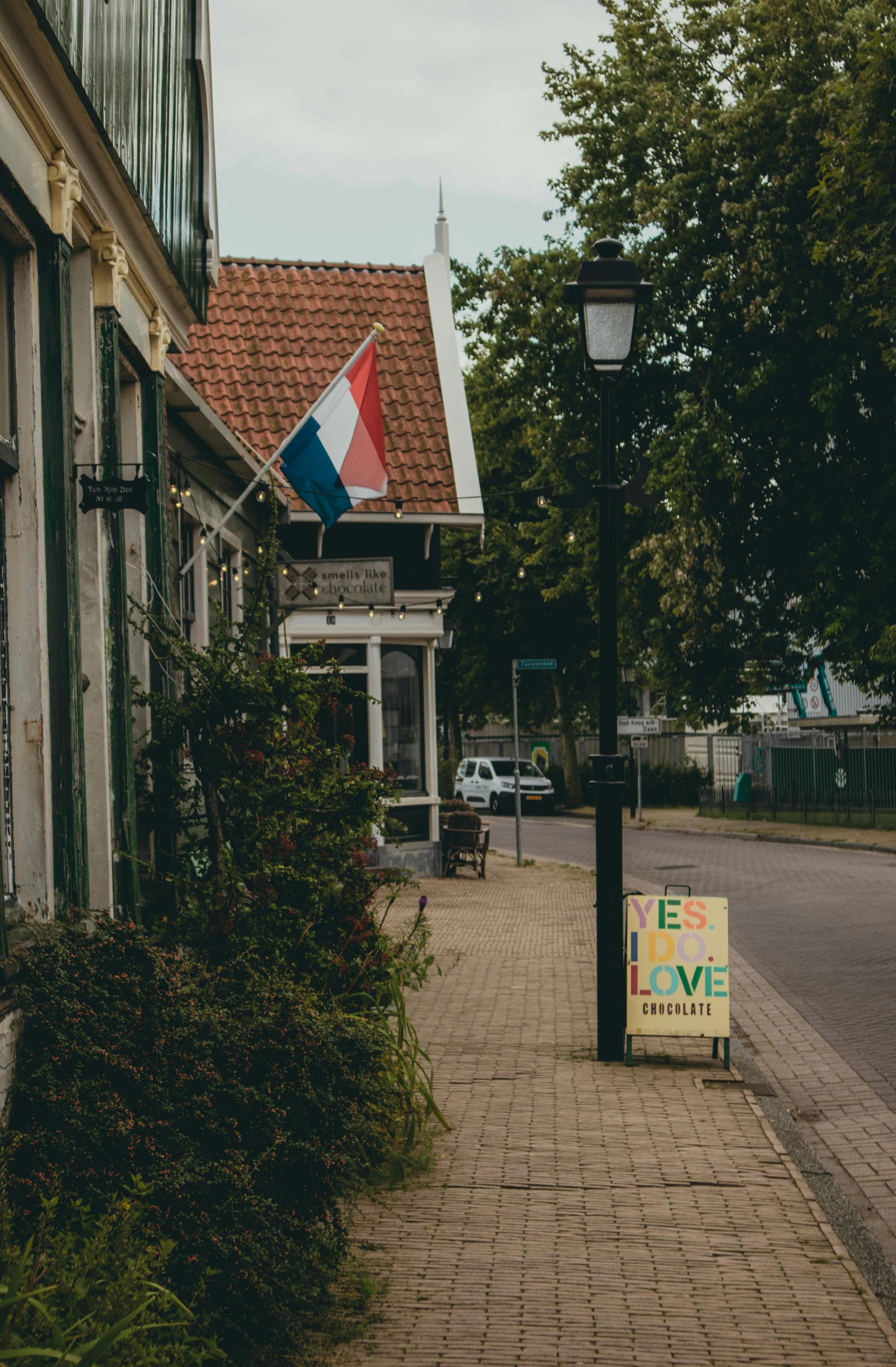 an image of a colorful sign next to a building