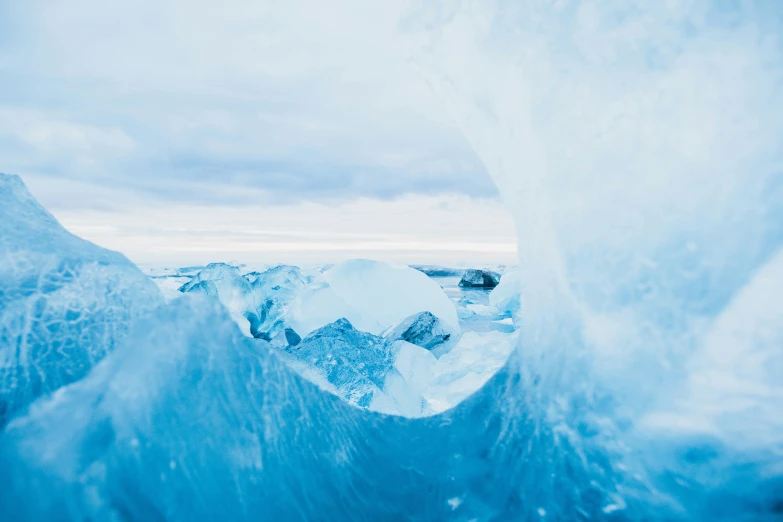 an image of a snowy mountains with ice formations