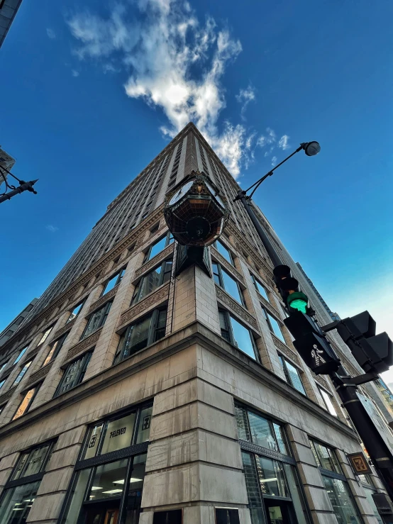 a building with windows that are covered in a wire net