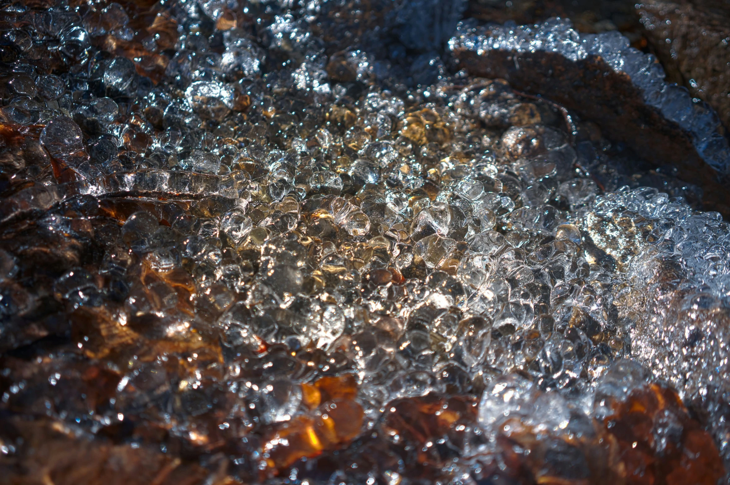 water bubbles over a table with dirt on it