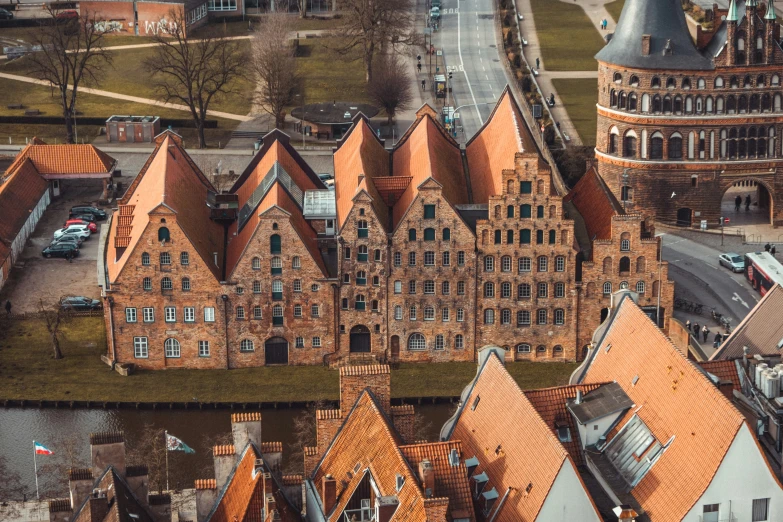 an aerial view shows rows of brick buildings, which have been used as churches