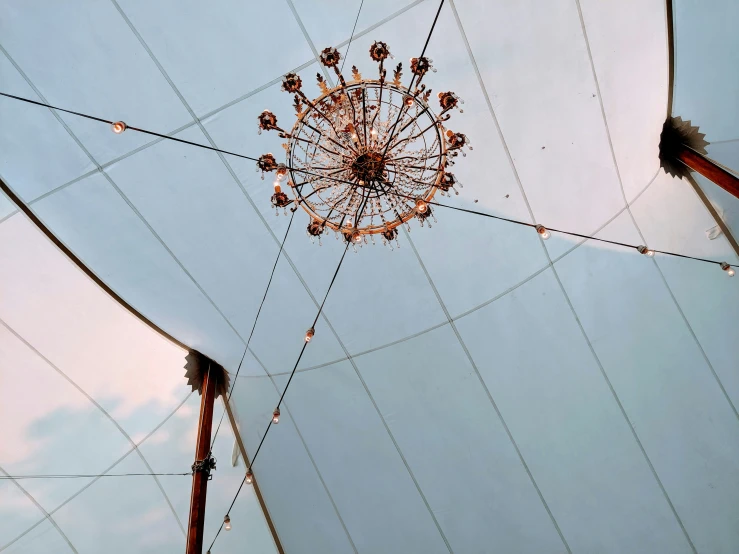 an overhead view of an oriental structure with the sky in the background