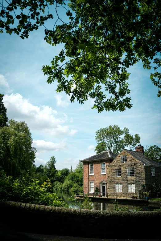 an old rundown brick building in the middle of a forest