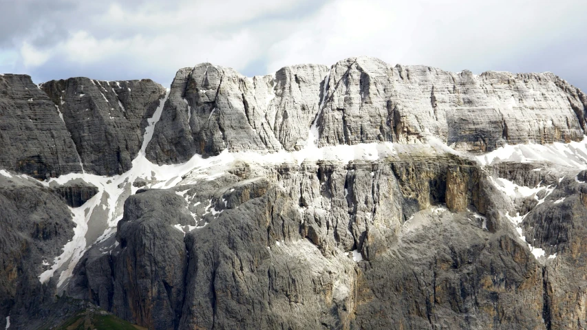 several snow covered mountains are next to each other