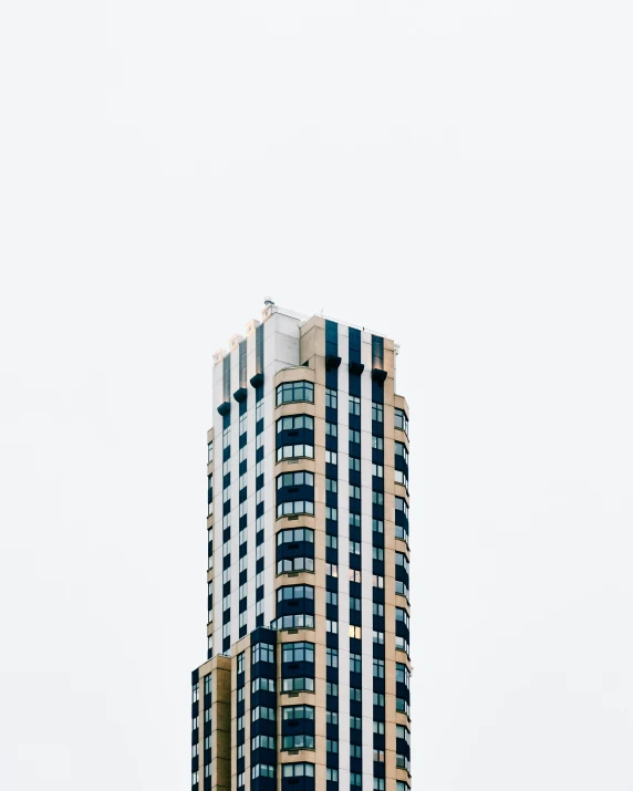 looking up at a very tall building in the sky