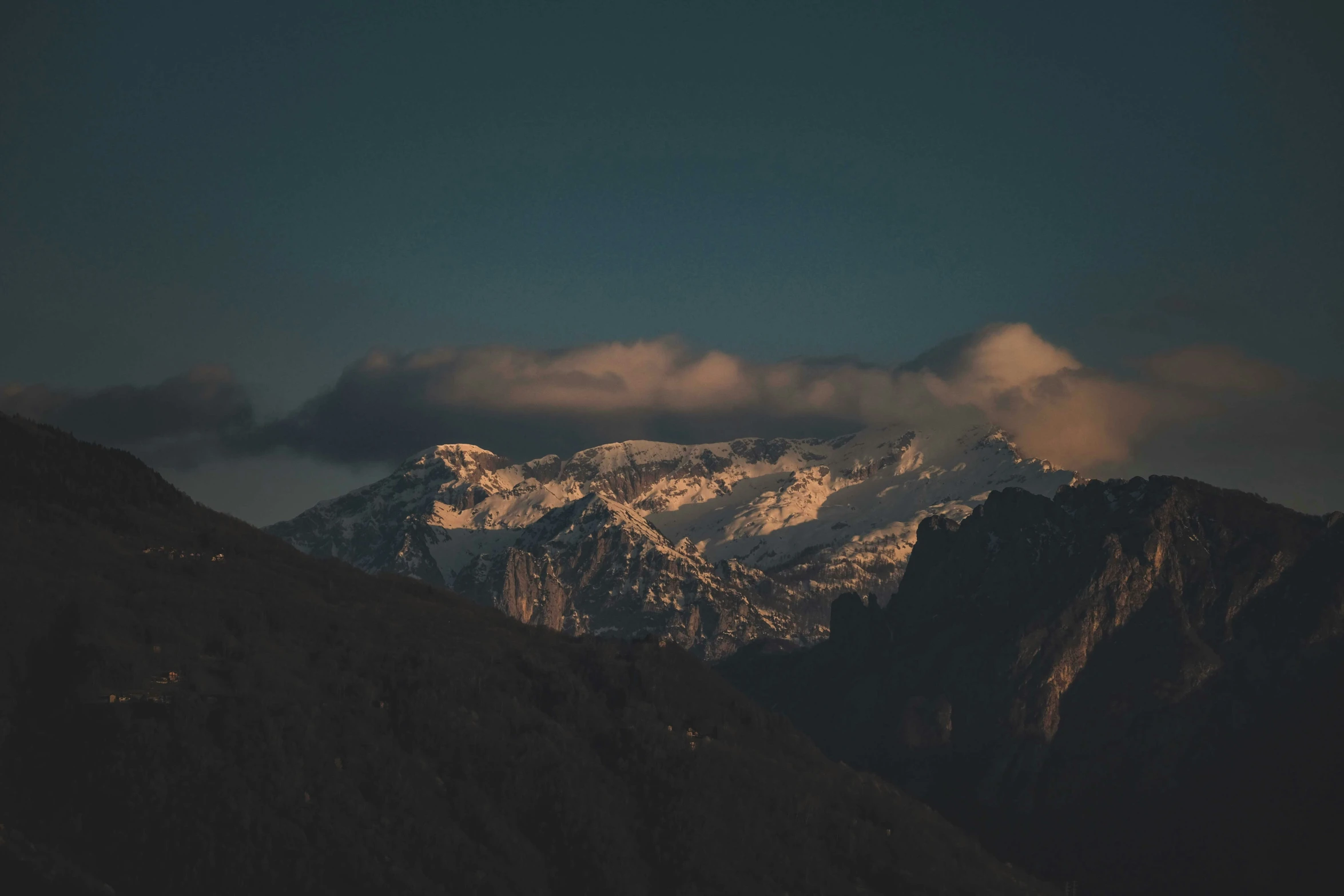 a very big mountain that is covered in snow