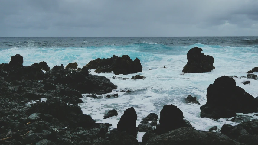 a rocky beach and a body of water