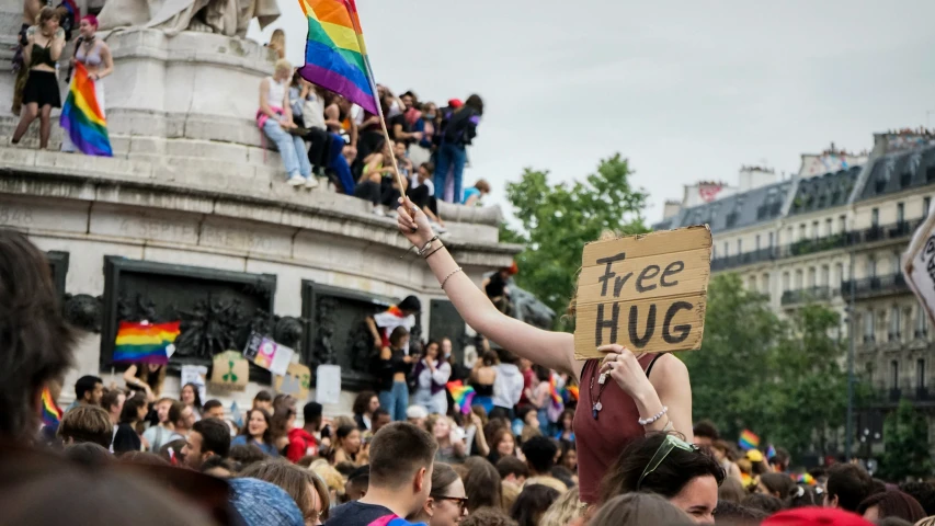 a large group of people at a gay pride rally