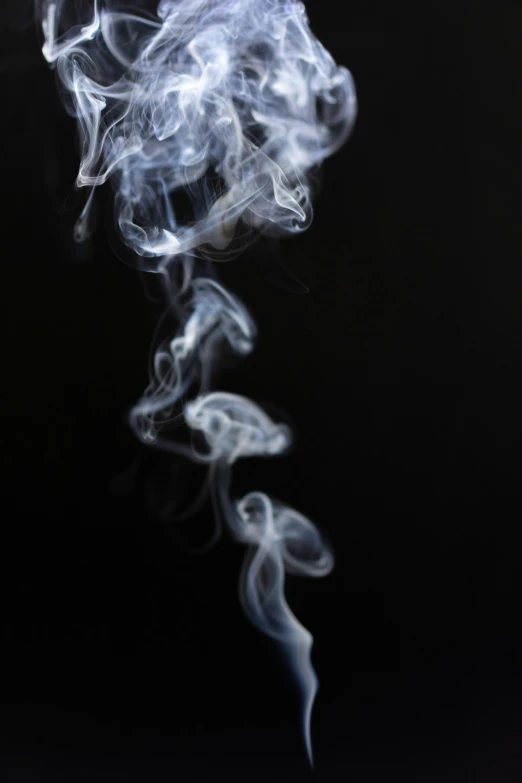 smoke with a black background in the corner