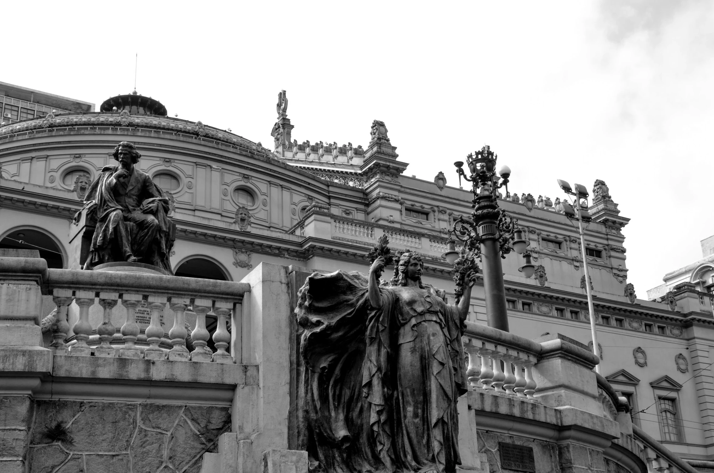 a very big pretty building with statues on it