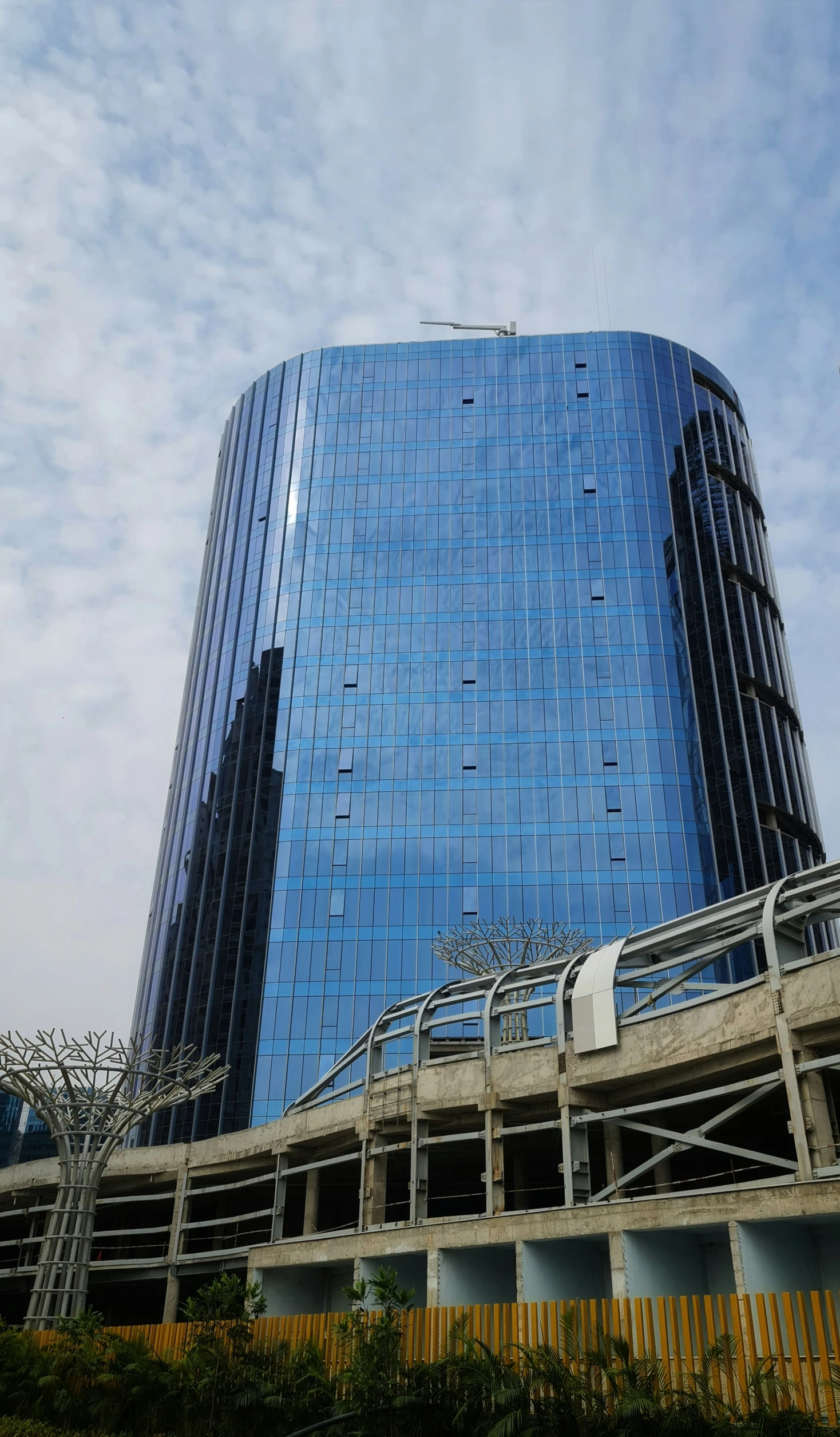 a very tall building with a sky background