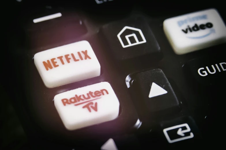 closeup view of a keyboard with netflix and youtube on it