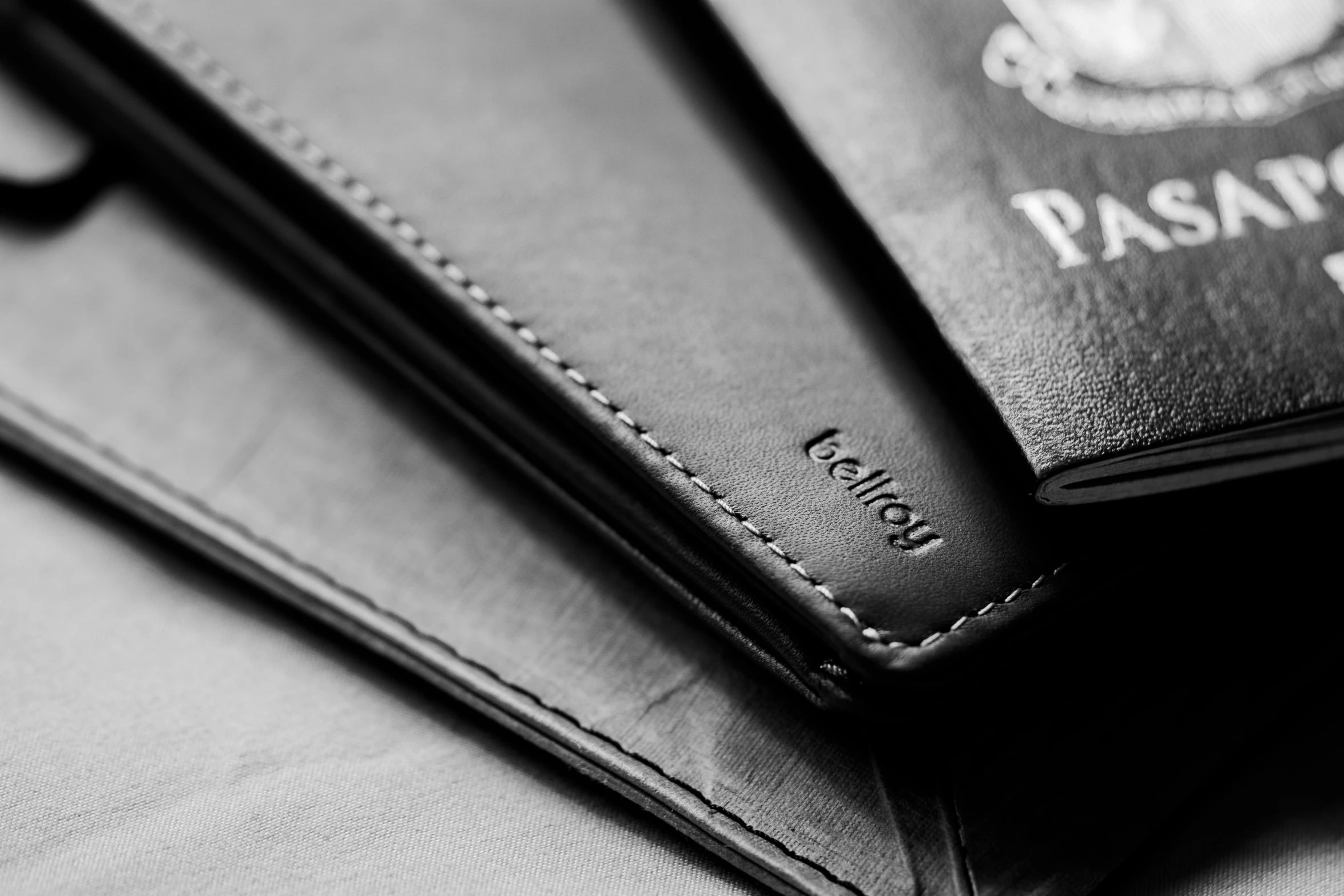 an image of two passports on a bed