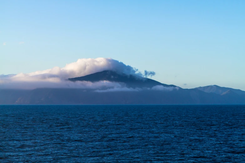 some mountains that are out in the water