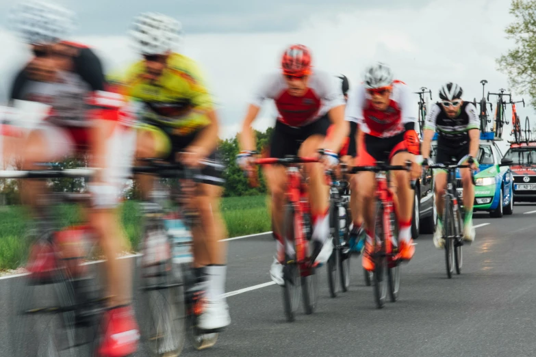 many people riding on bikes in different directions