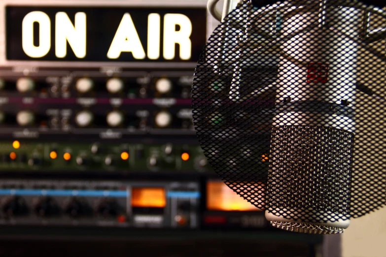 a microphone in front of a control panel