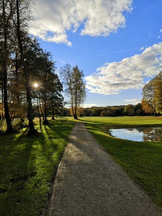 a path that goes to a pond on the side