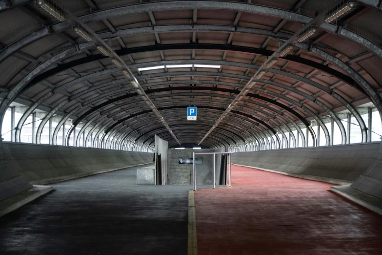 the hallway in an empty, long building