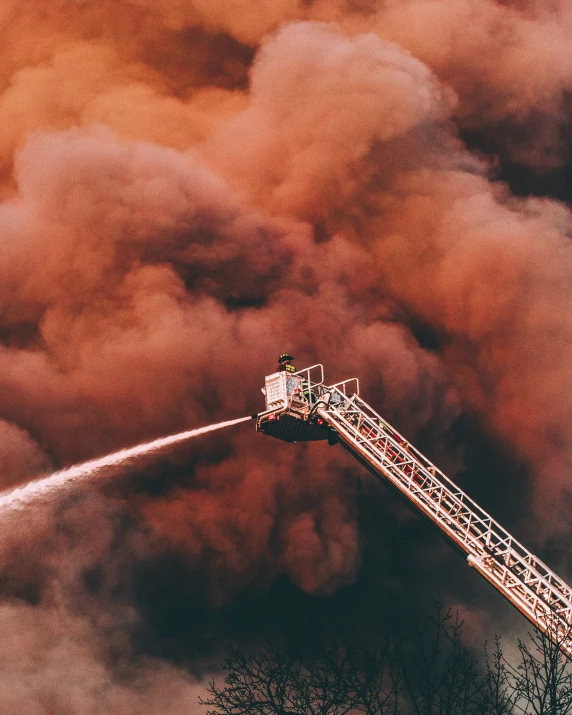 a firetruck with water pouring from the top