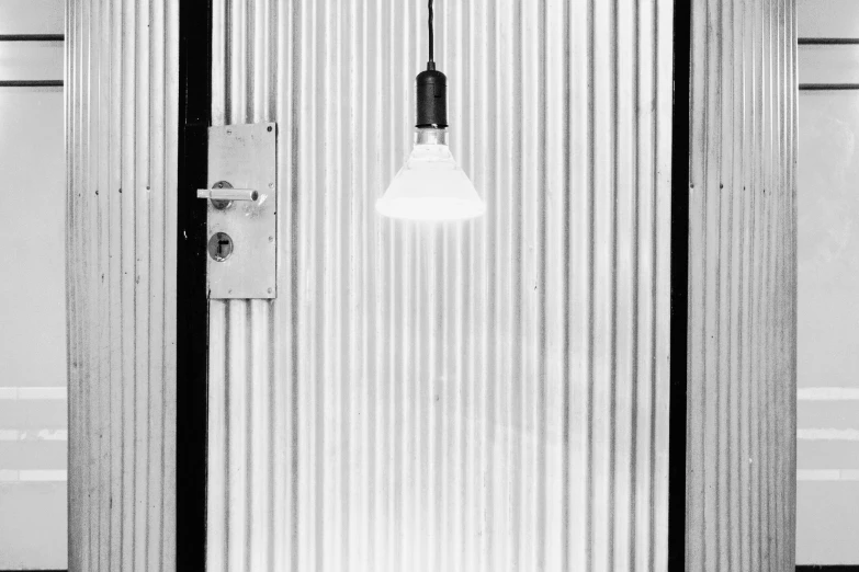 an open elevator with an electric light