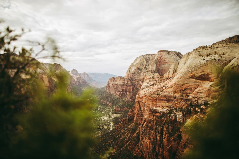 a mountain view looking down at canyons