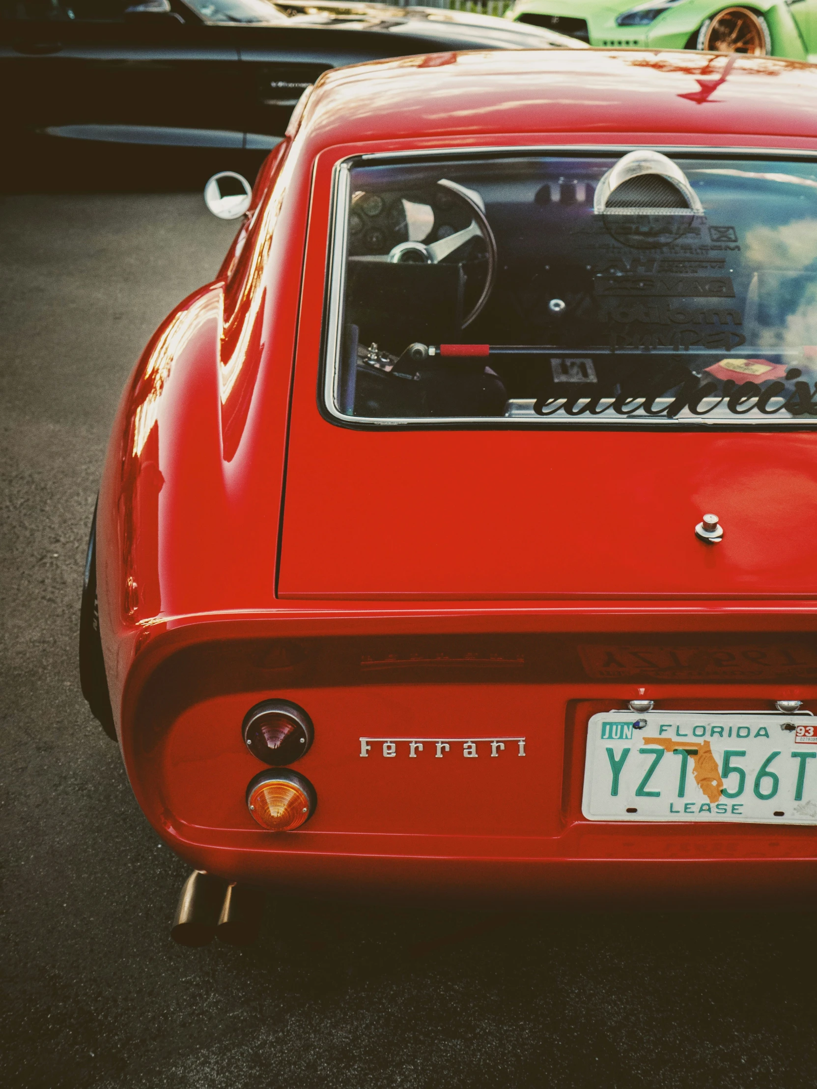 a close up of a small red car