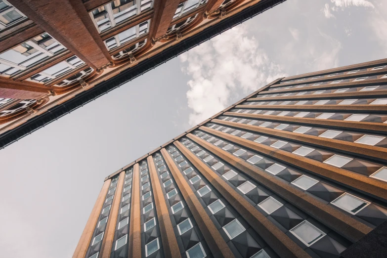 looking up from below into the high rise building