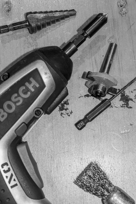 a black and white picture with some tools