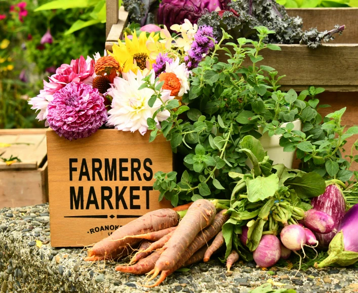 an assortment of fresh vegetables sits outside