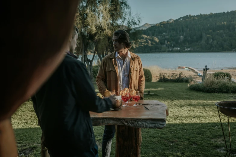 an image of a guy  his food outdoors