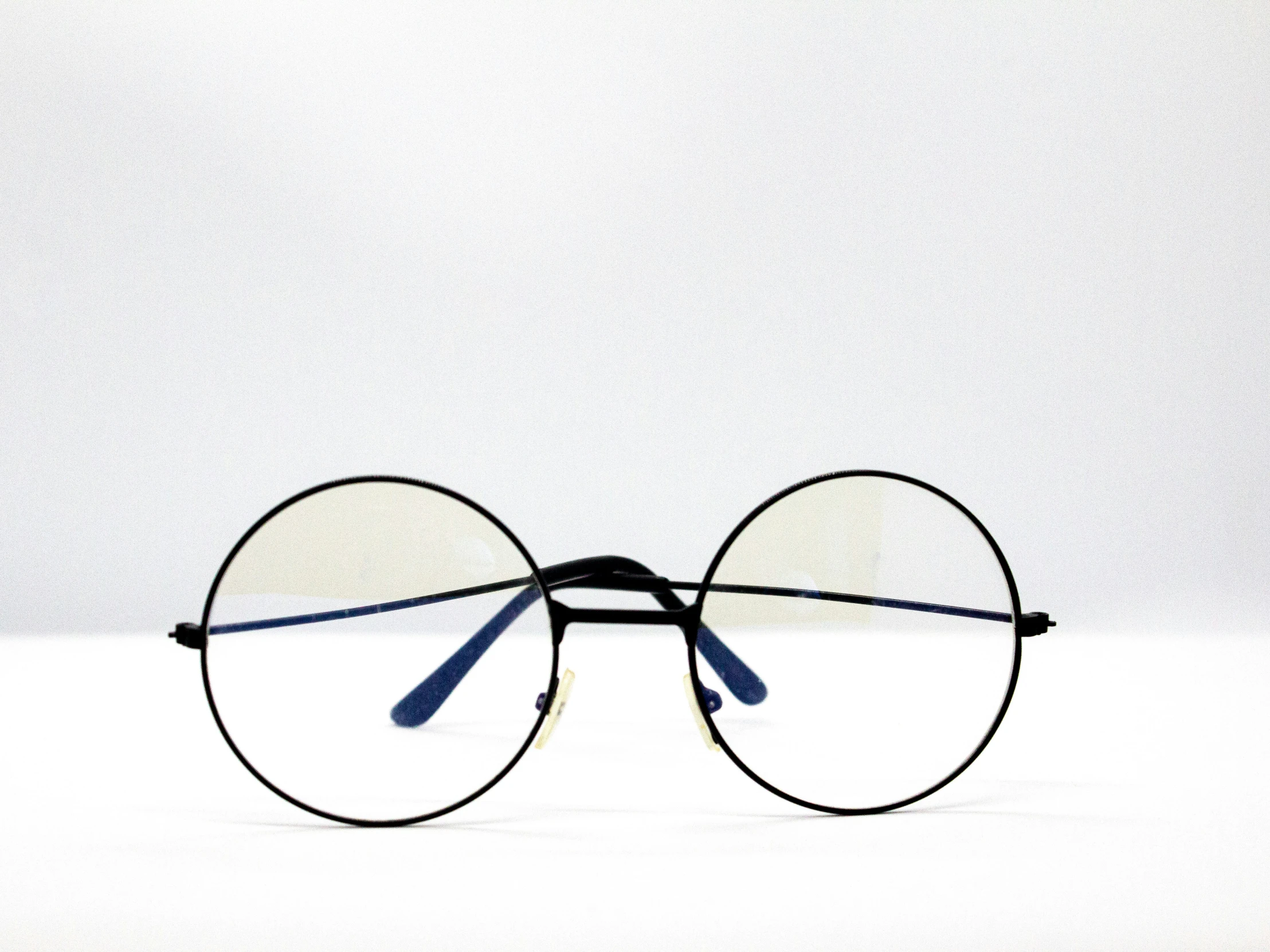 a close up of a pair of glasses with the lens closed