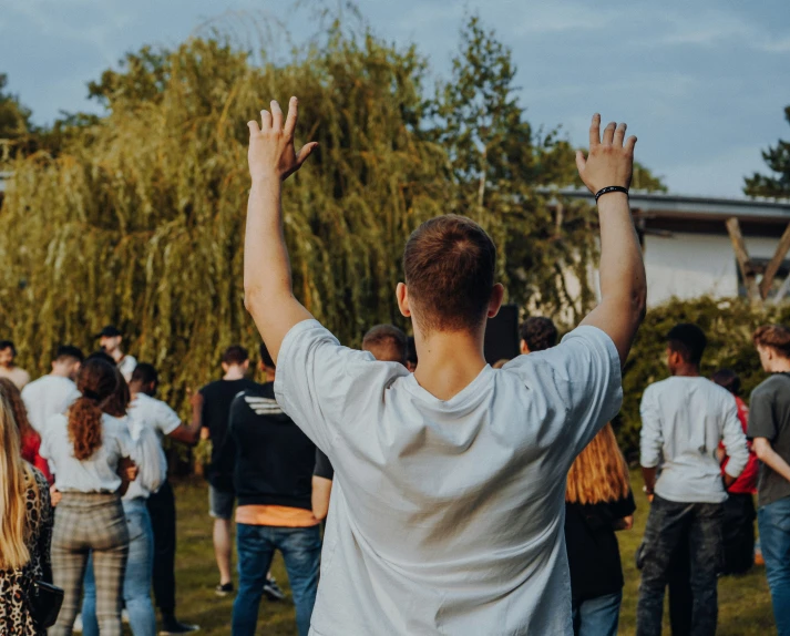 group of people standing in a line outside