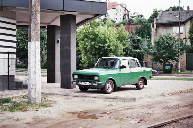 the old pick up truck is parked in the lot