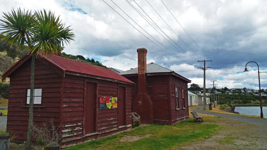 a picture of a building that is on the side of the road