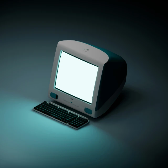a laptop sitting next to an older computer