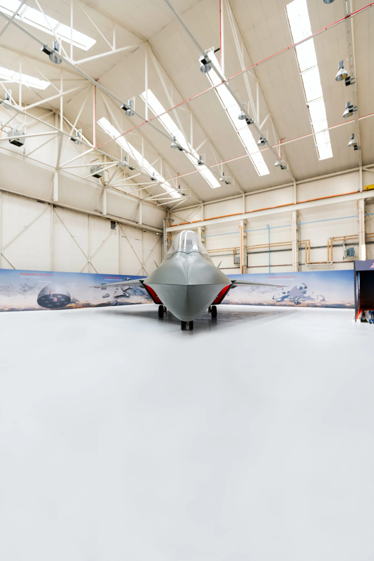 a large airplane on display in an airport hangar