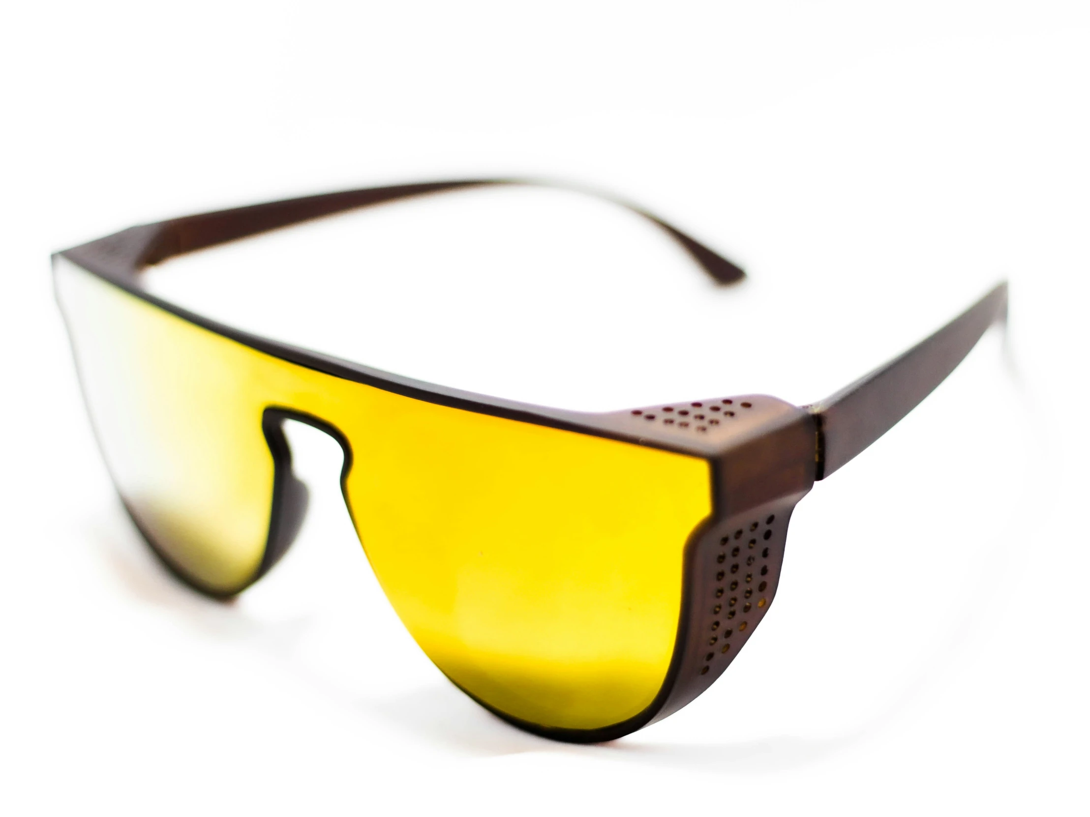 yellow sunglasses with a plastic frame and rubber band on the side