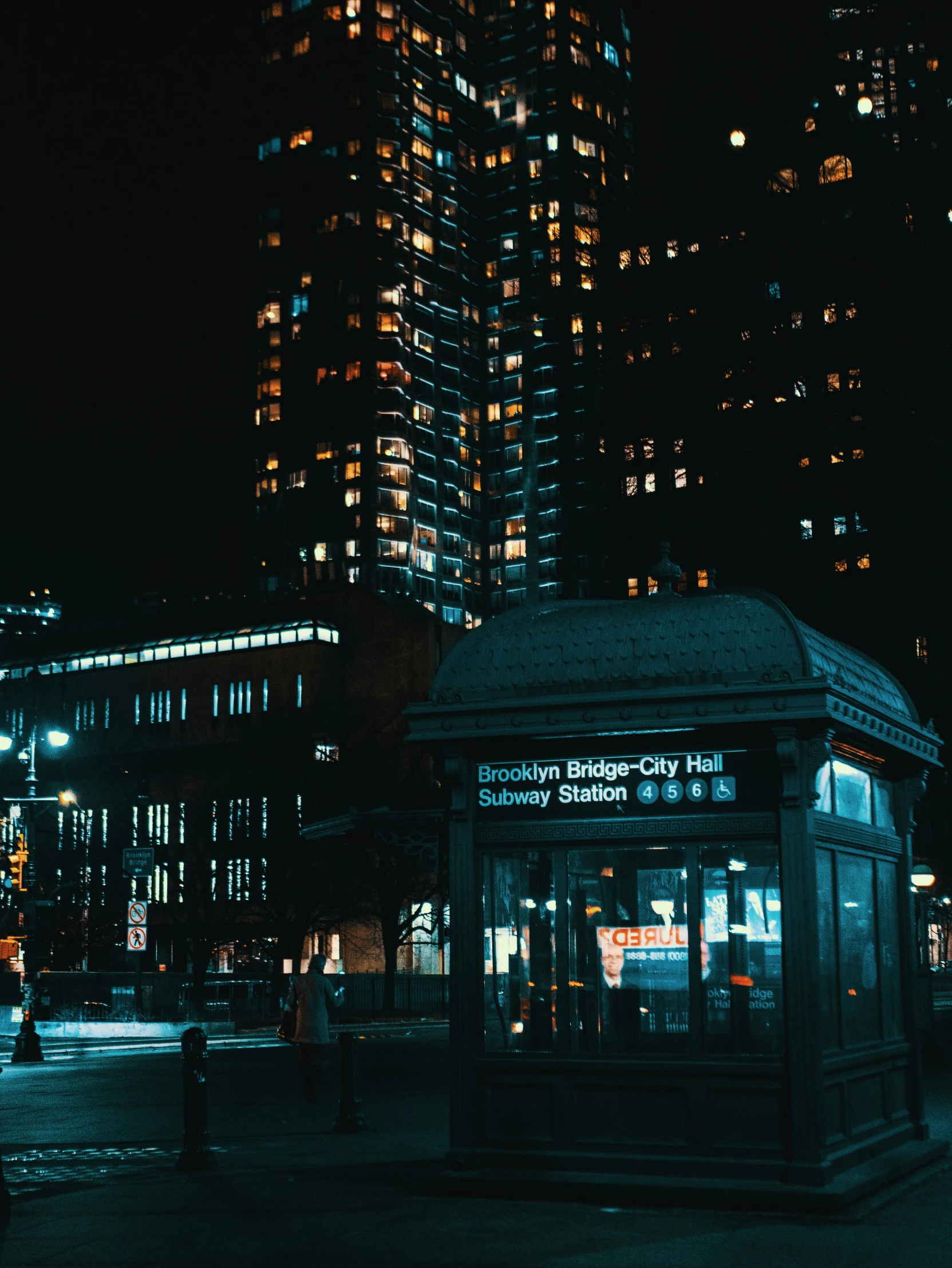 a po of a city building lit up at night