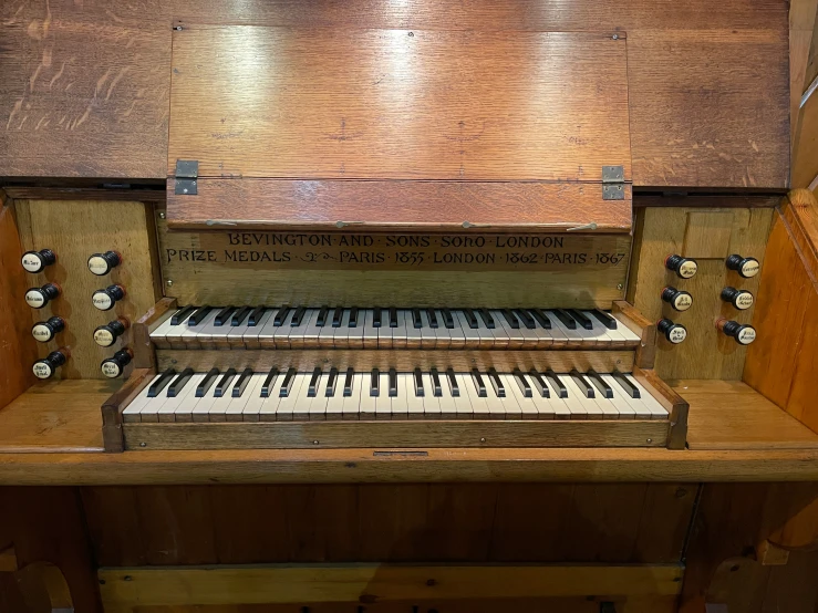 an old, broken piano sits in a church