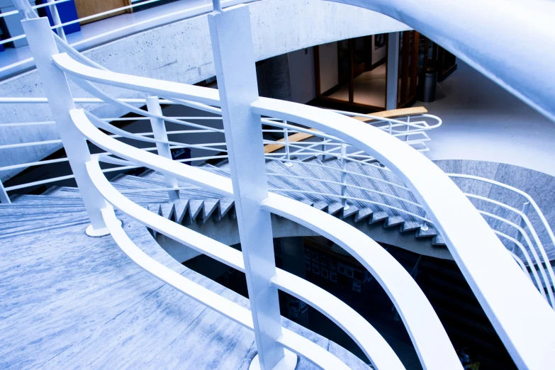 a close up of spiral stairs in a building