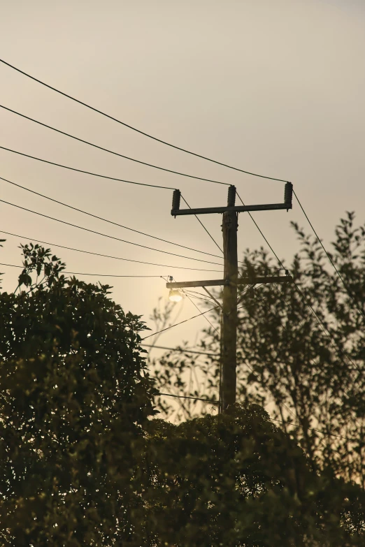 a pole that is connected to some electrical wires