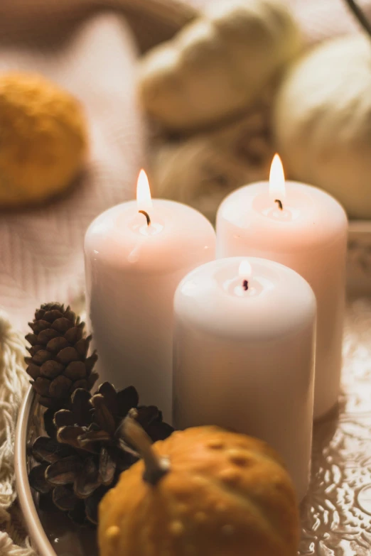 the white candles have been placed next to each other