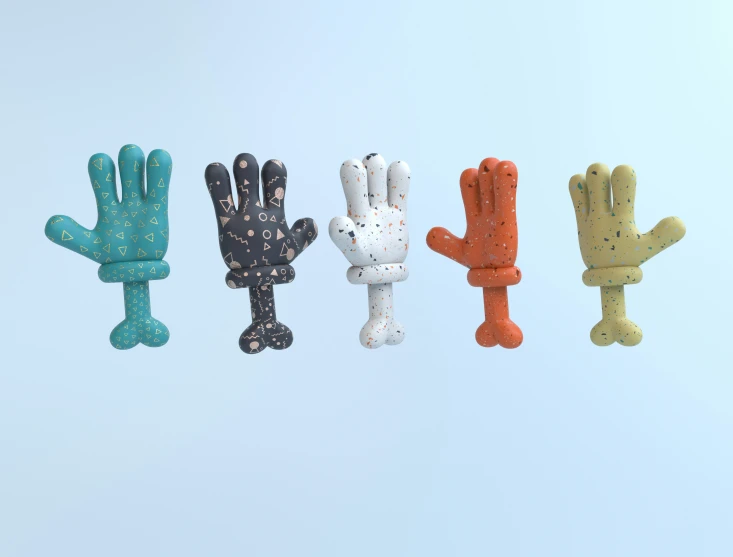 several plush gloves attached to each other on a string