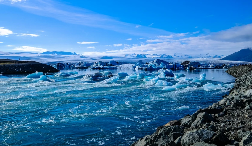 a large body of water filled with ice