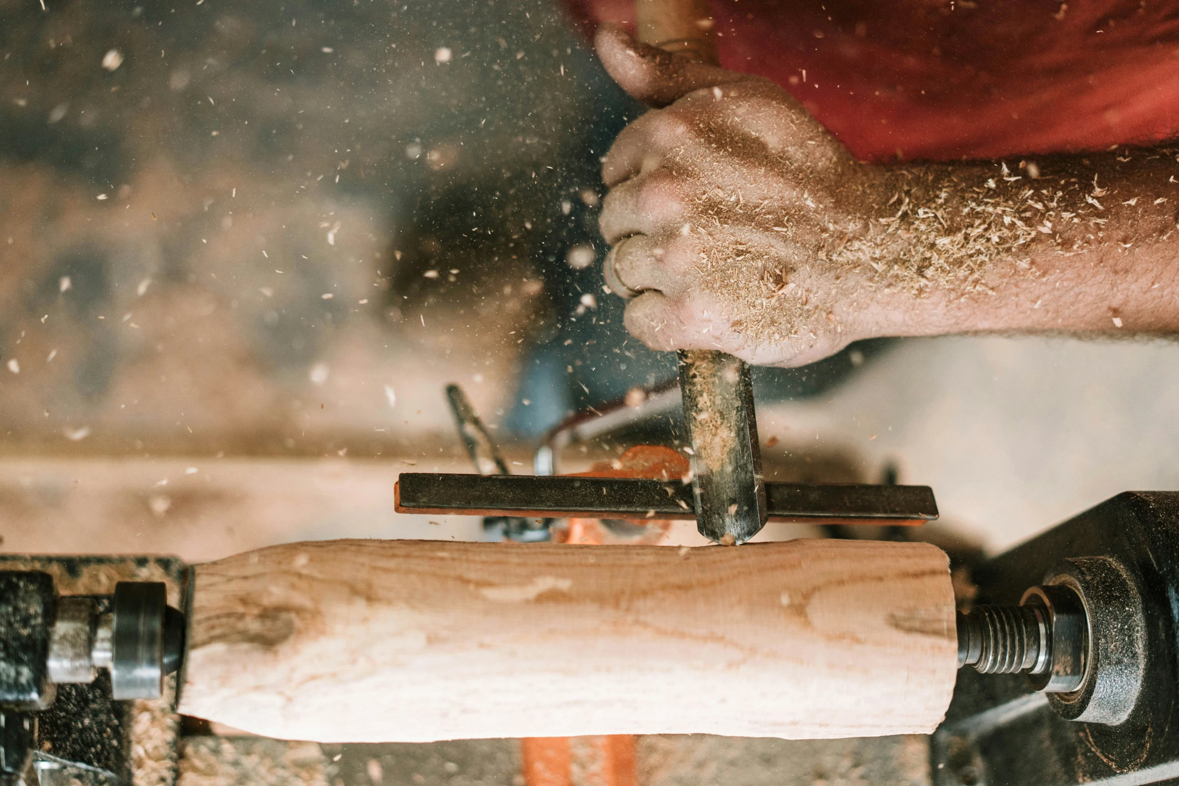 an image of a person using a circular mallet