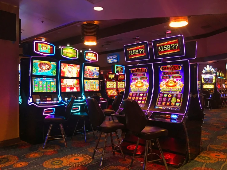 a large casino slot machine that is decorated with neon lights