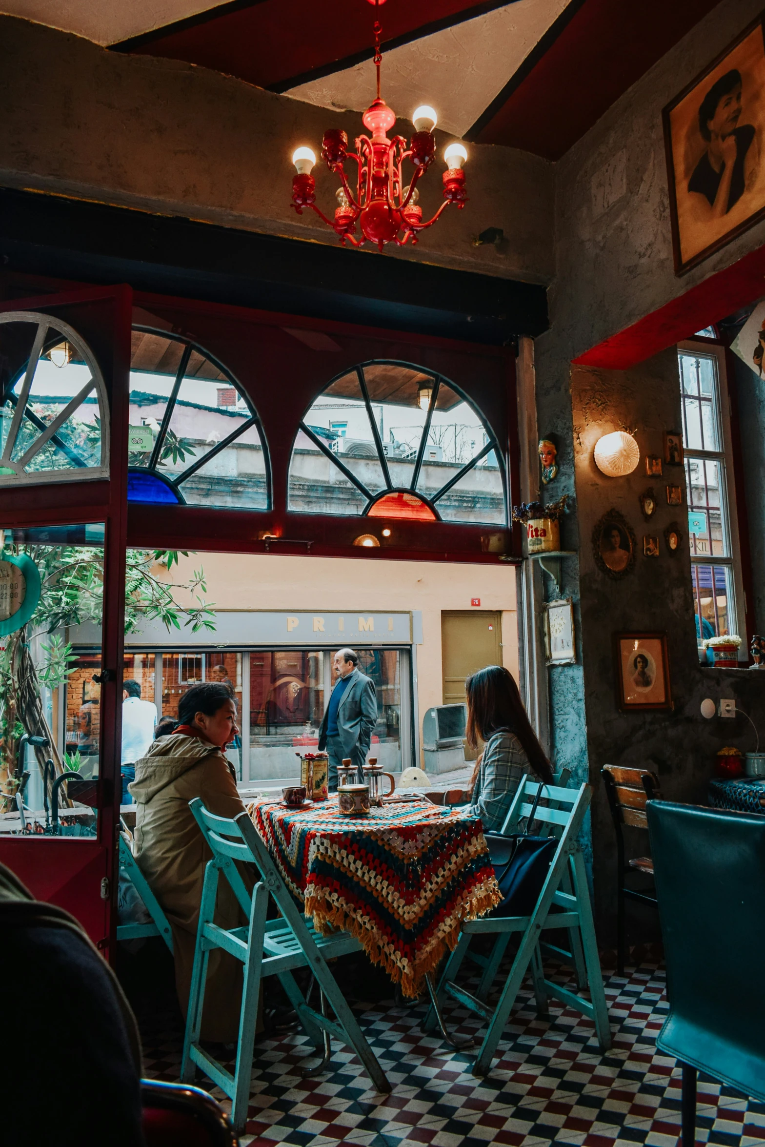 a couple is sitting at the table in a restaurant