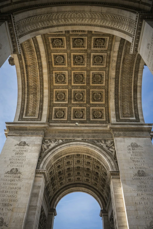an arched arch with several writings on the sides