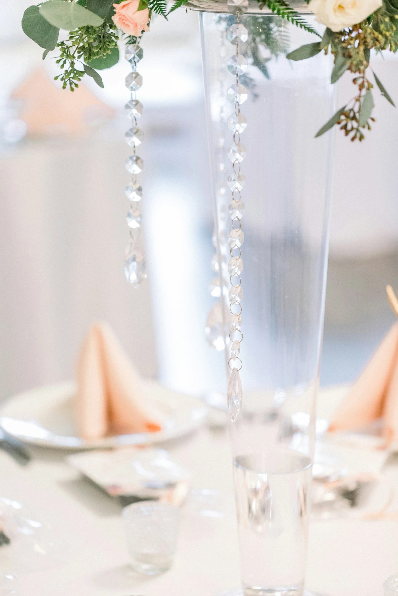 a vase filled with flowers sitting on top of a table